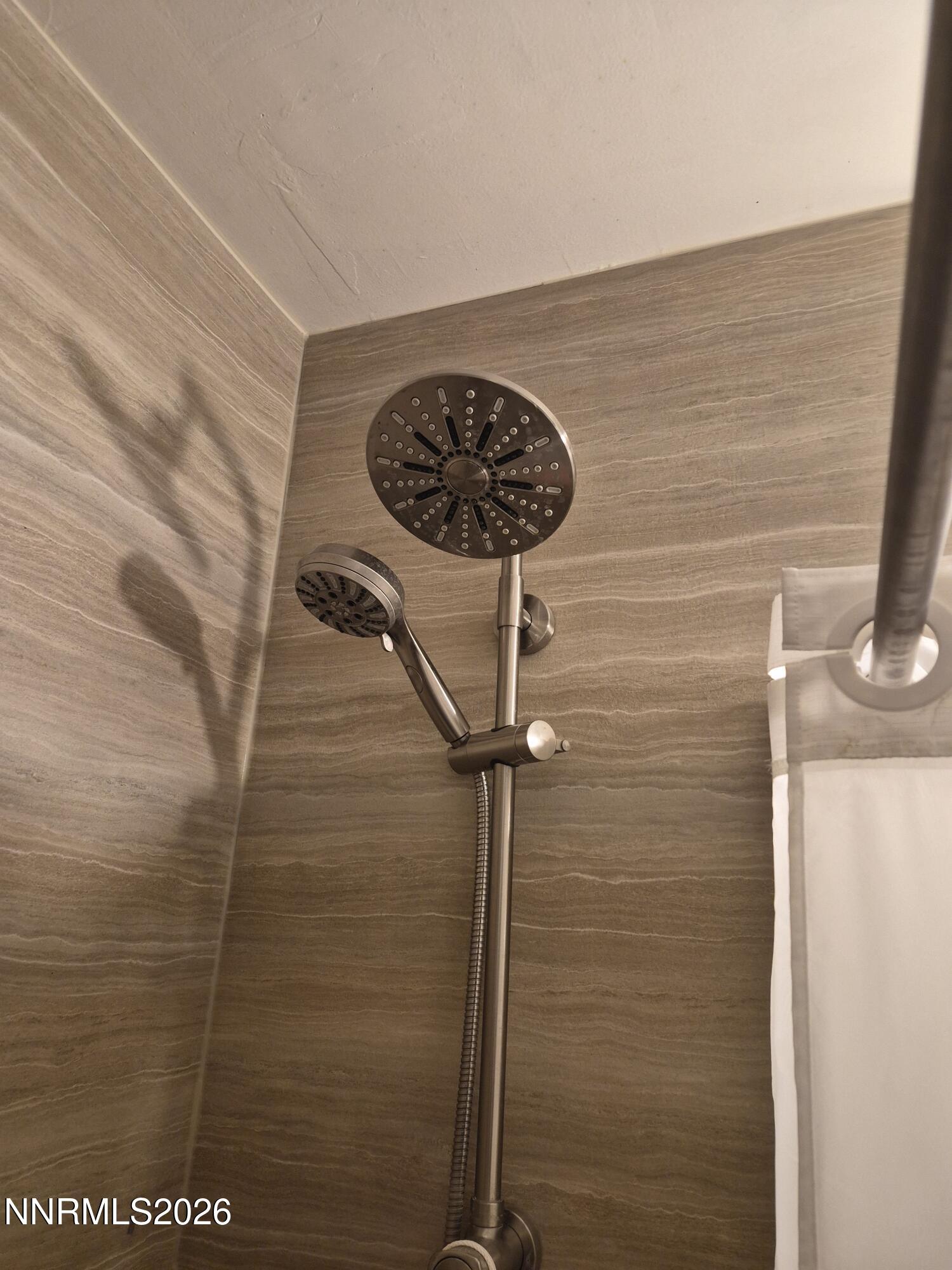 3280 Lone Tree Road Fallon, NV 89406 - Photo 48 of 59 a close view of a shower in a bathroom
