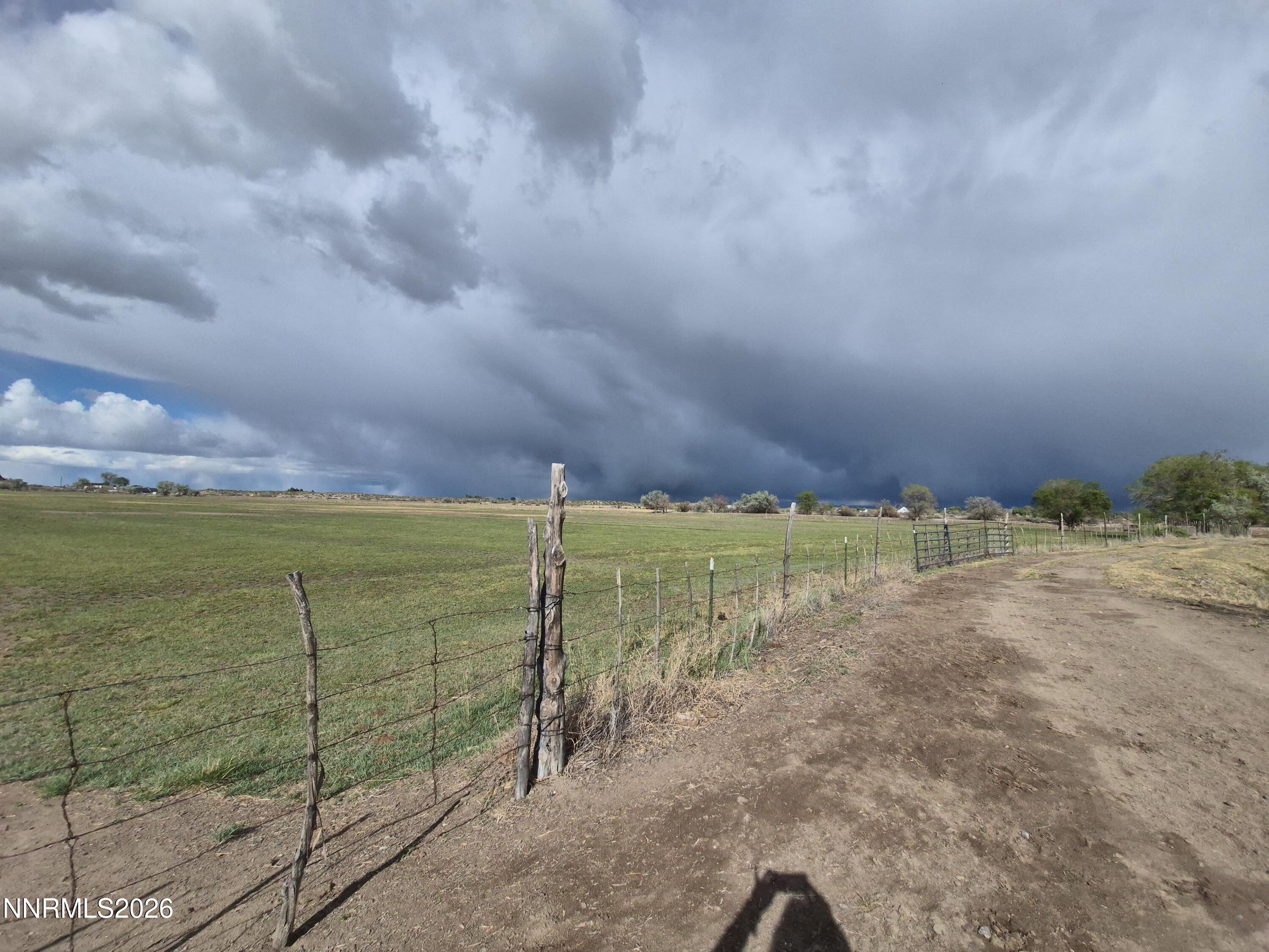 3280 Lone Tree Road Fallon, NV 89406 - Photo 10 of 59 a view of a field with sitting area