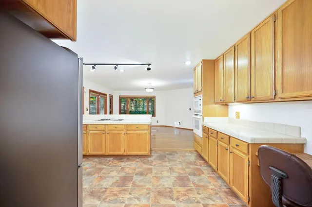 a view of a yard with a bench