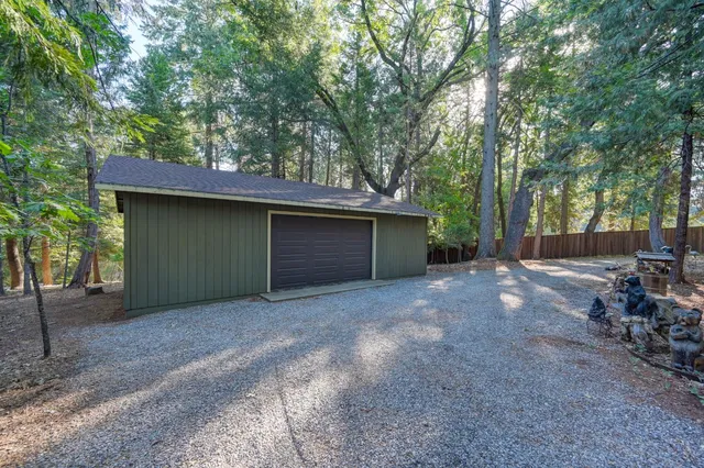 a front view of a house with garage