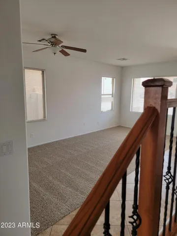 a view of entryway and kitchen