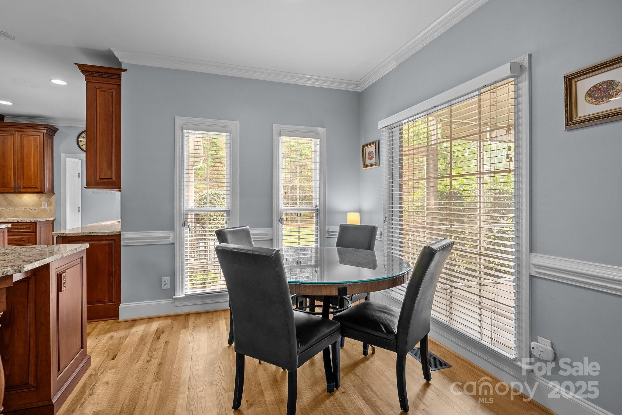 9717 Waterton Court Huntersville, NC 28078 - Photo 16 of 47 a view of a dining room with furniture and window
