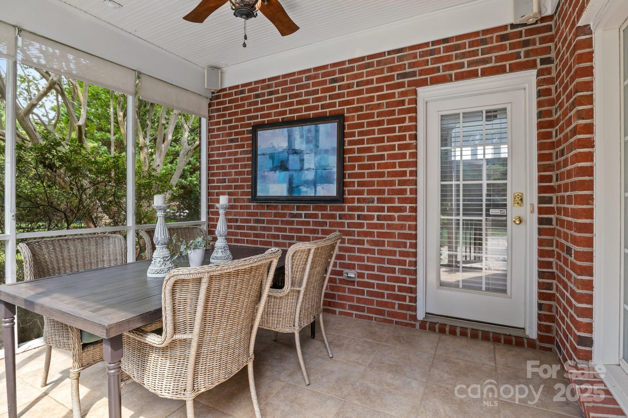 9717 Waterton Court Huntersville, NC 28078 - Photo 31 of 47 a view of a patio with a table and chairs