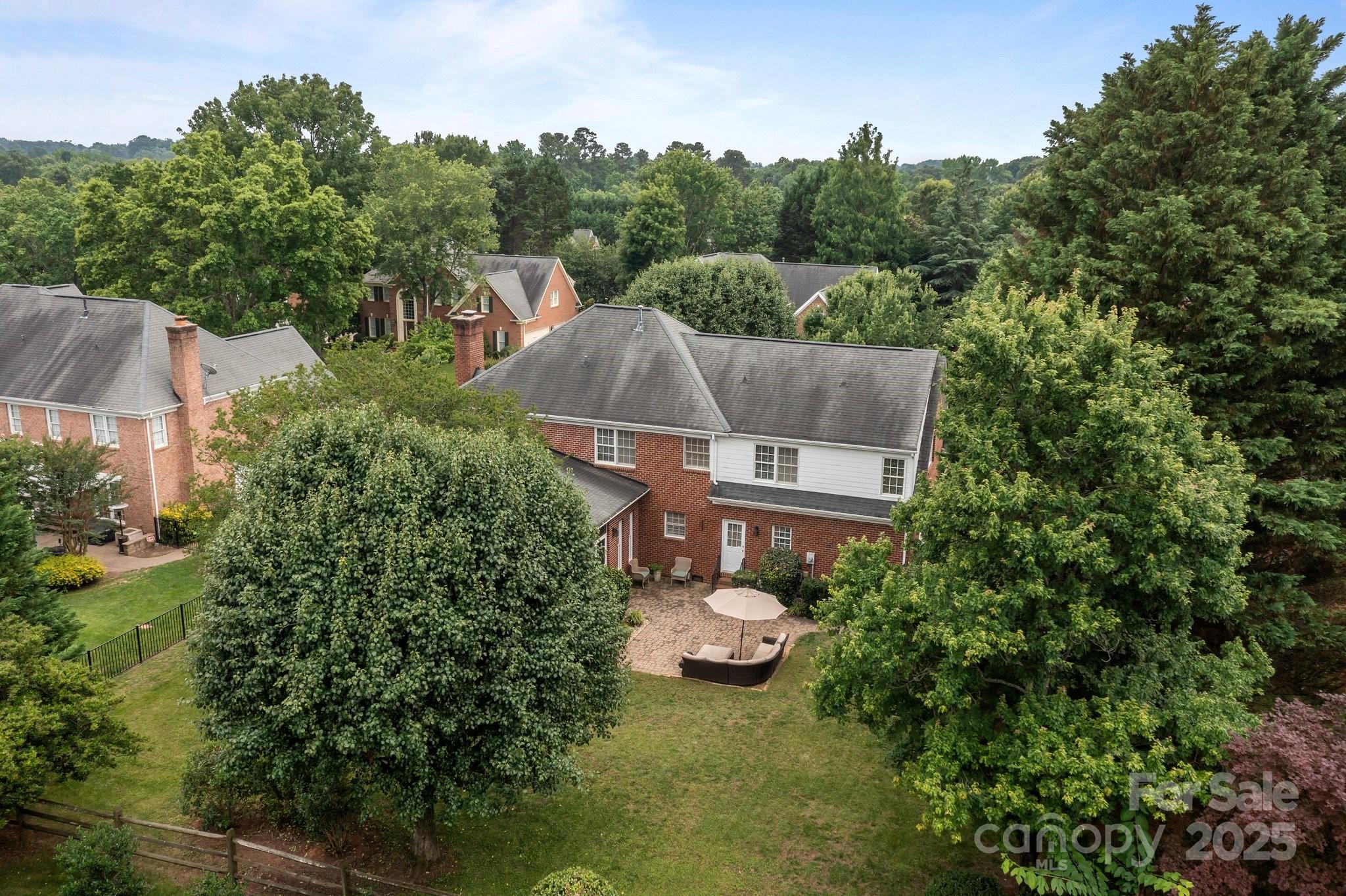 9717 Waterton Court Huntersville, NC 28078 - Photo 40 of 47 an aerial view of a house with outdoor space swimming pool and mountains