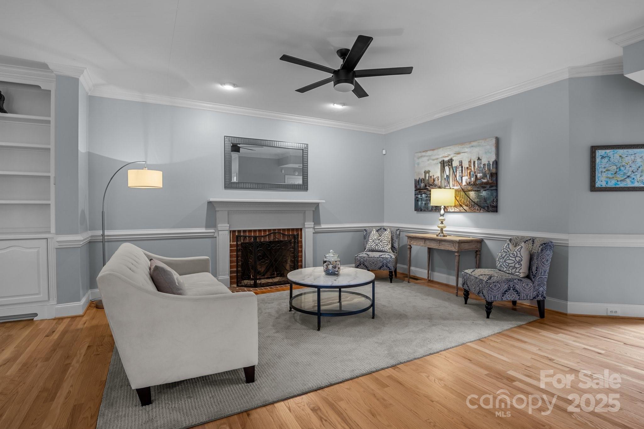 9717 Waterton Court Huntersville, NC 28078 - Photo 7 of 47 a living room with furniture and a fireplace