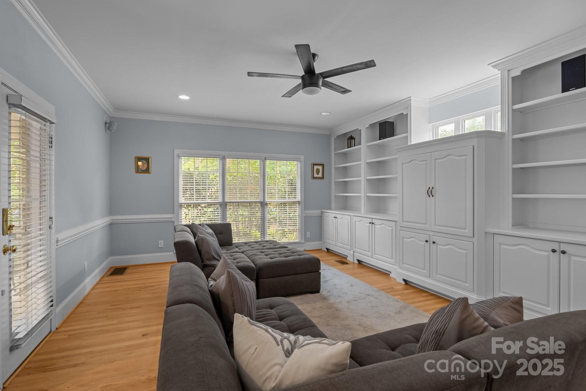 9717 Waterton Court Huntersville, NC 28078 - Photo 8 of 47 a living room with furniture and a large window