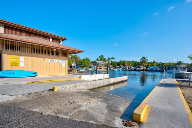 a view of a lake with sitting area