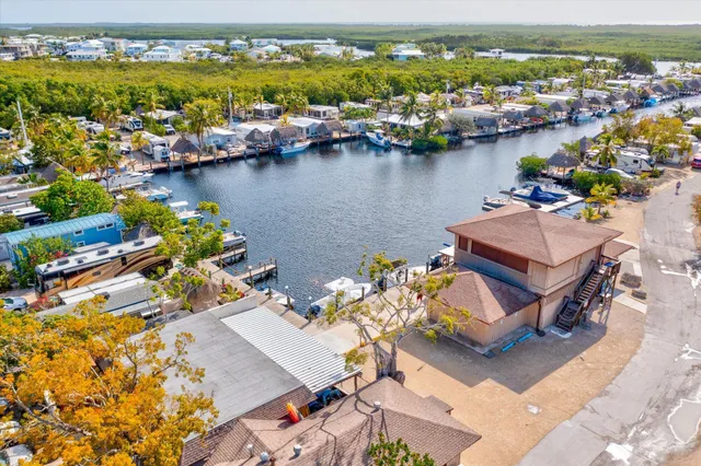 a street sign on a brick wall