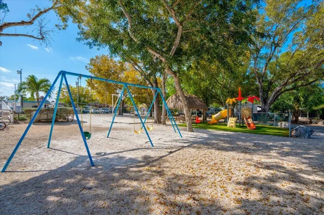 a view of park with a slide