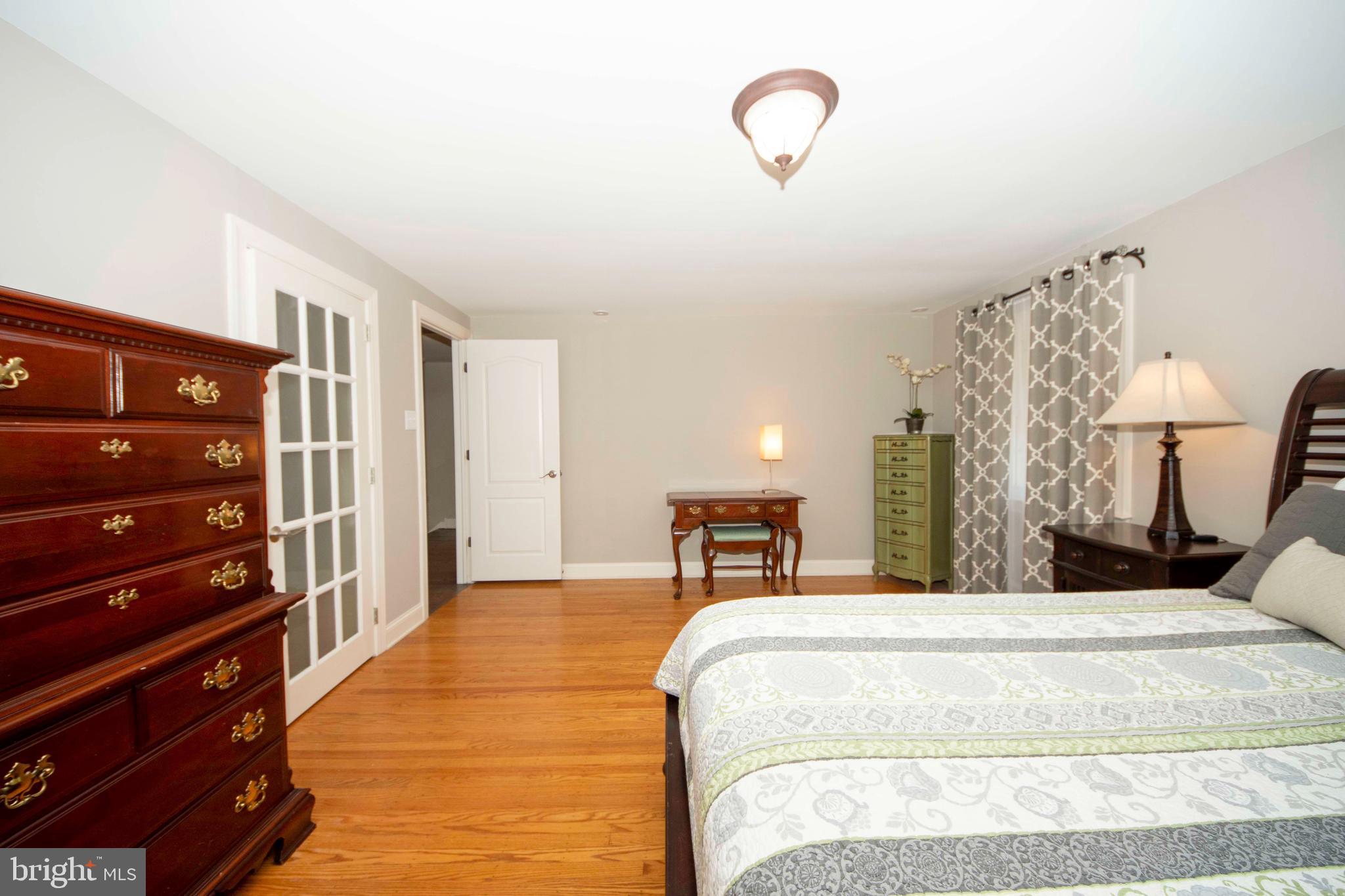 174 Pugh Road Wayne, PA 19087 - Photo 24 of 42 a bedroom with bed and a closet