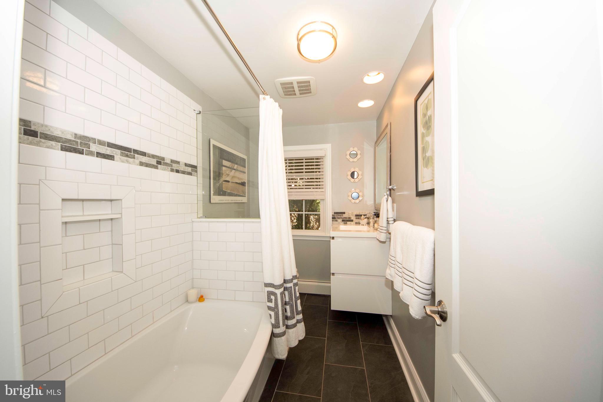 174 Pugh Road Wayne, PA 19087 - Photo 28 of 42 a bathroom with a sink a toilet and shower
