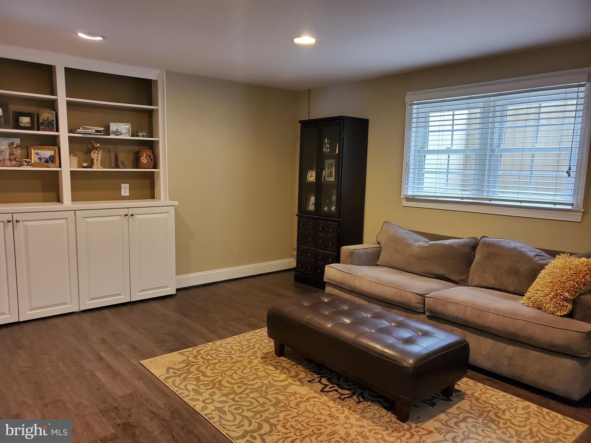 174 Pugh Road Wayne, PA 19087 - Photo 31 of 42 a living room with furniture and a rug