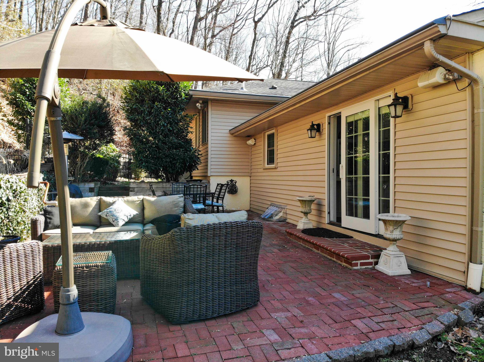 174 Pugh Road Wayne, PA 19087 - Photo 37 of 42 a patio with couches and a fire pit