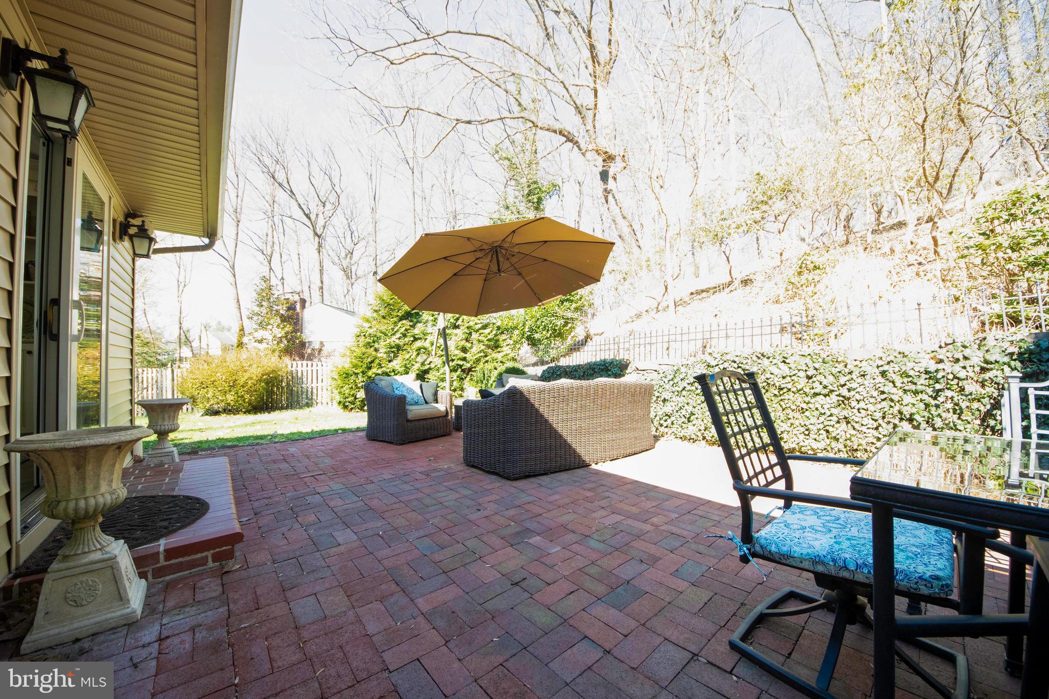 174 Pugh Road Wayne, PA 19087 - Photo 38 of 42 a view of a chairs and table in the patio