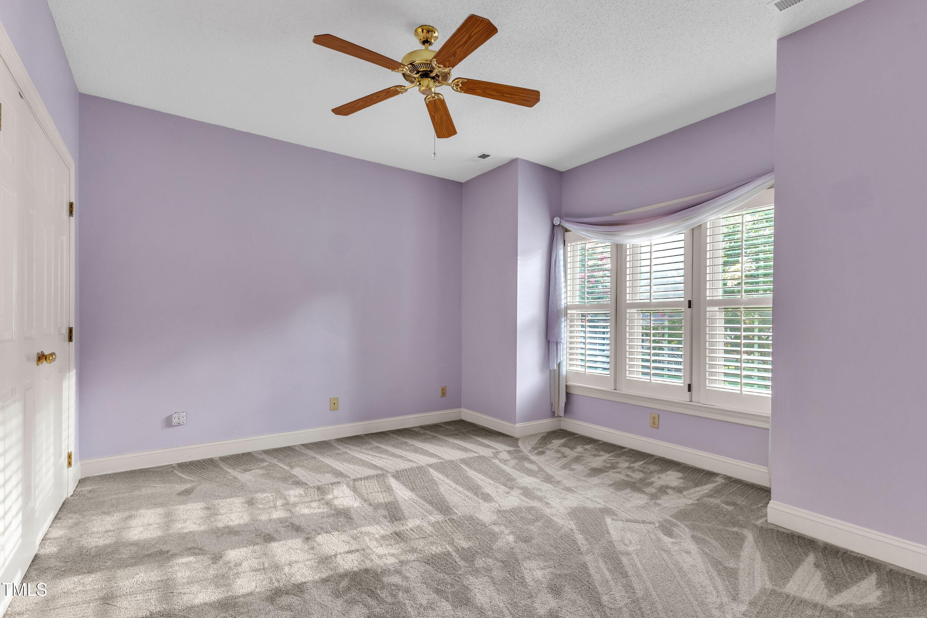 1210 Shadow Bark Court Raleigh, NC 27603 - Photo 16 of 32 a view of an empty room with a window