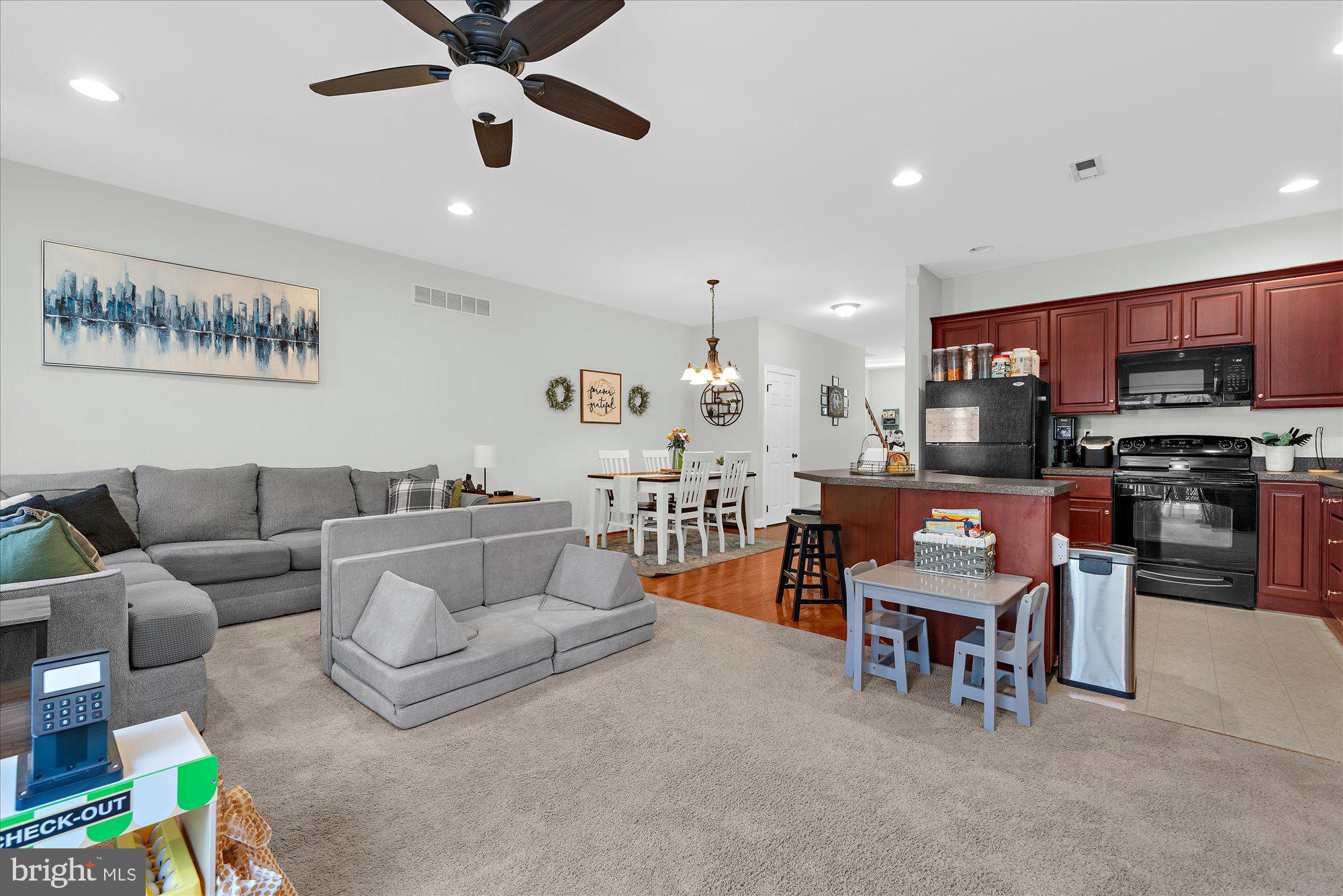 64 Sugar Maple Road Barto, PA 19504 - Photo 13 of 28 a living room with furniture and kitchen view
