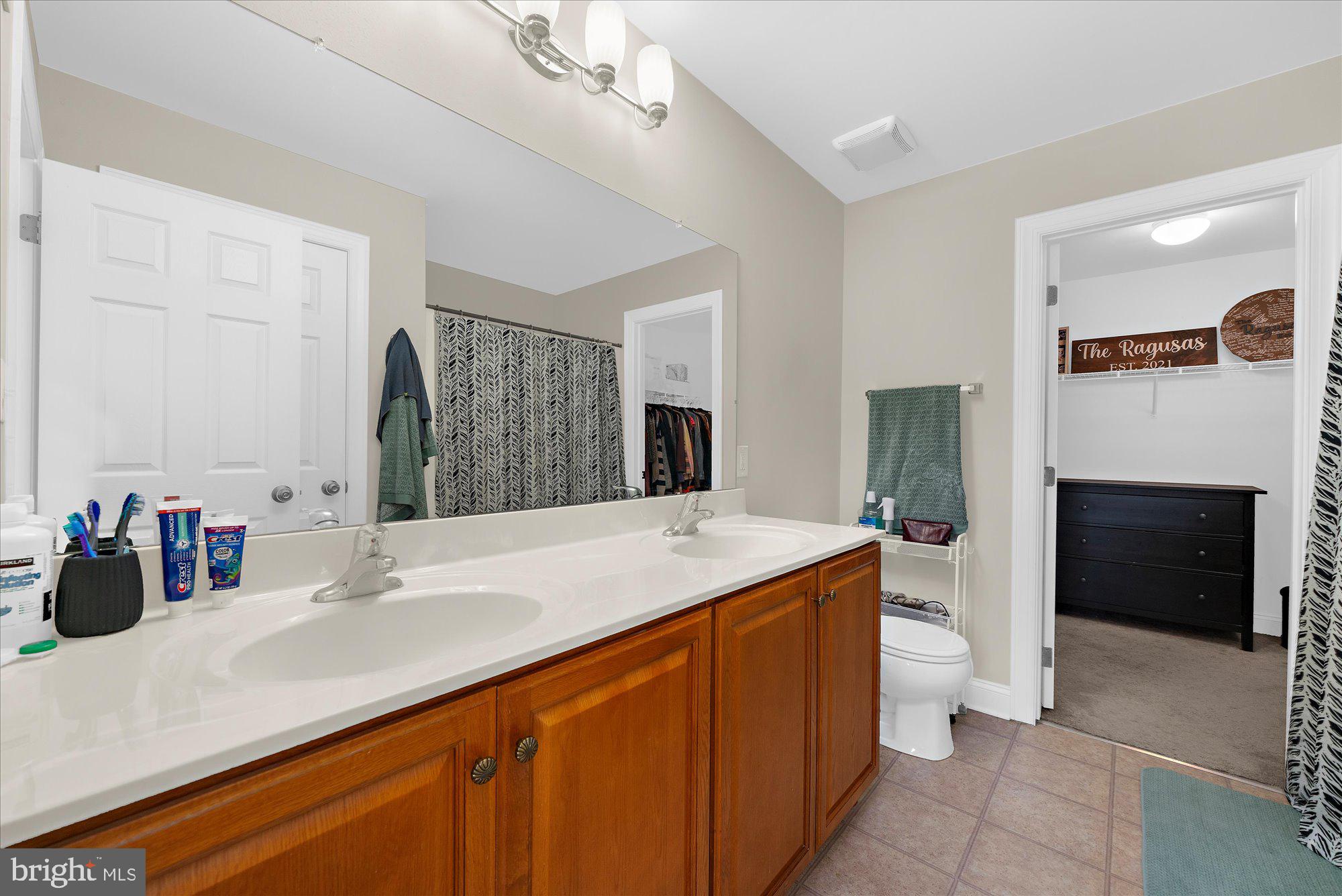 64 Sugar Maple Road Barto, PA 19504 - Photo 16 of 28 a bathroom with a sink double vanity and a mirror
