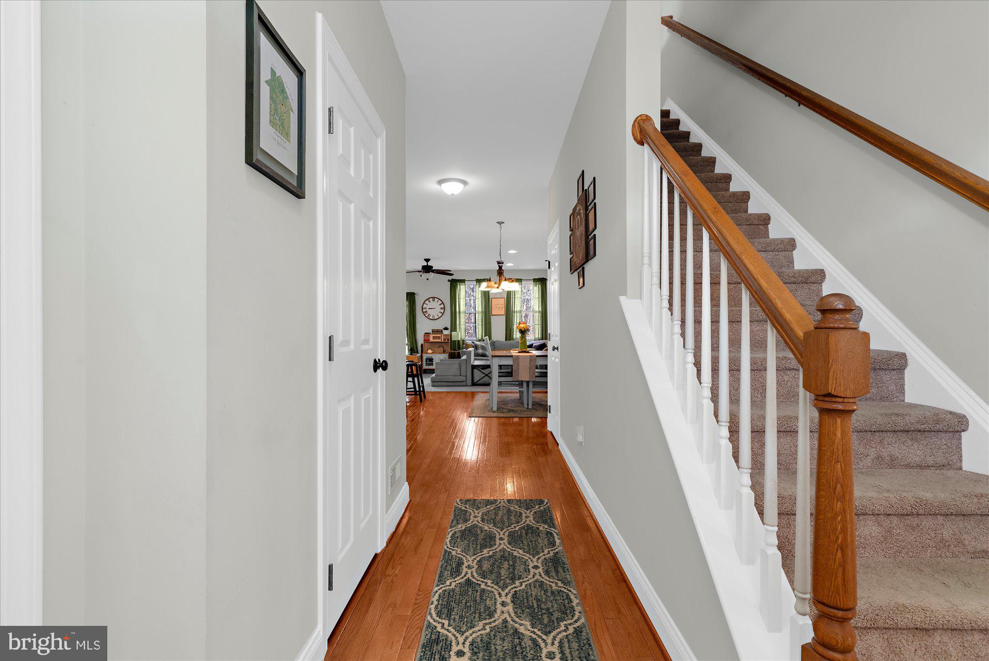 64 Sugar Maple Road Barto, PA 19504 - Photo 3 of 28 a view of a hallway with wooden floor and staircase
