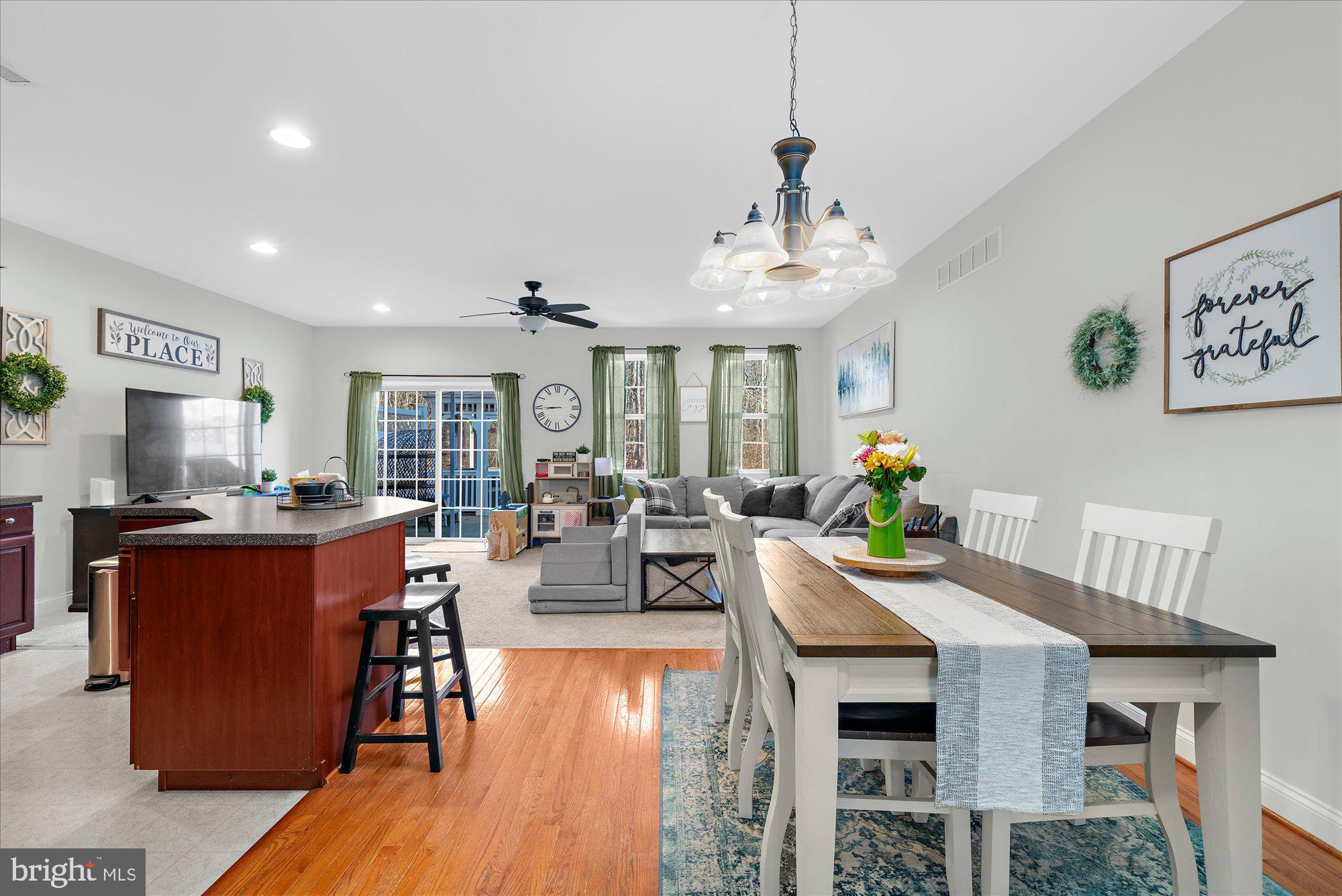 64 Sugar Maple Road Barto, PA 19504 - Photo 7 of 28 a view of a dining room with furniture window and wooden floor