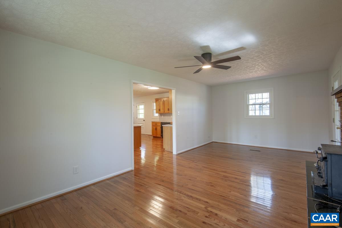 8882 James River Road Shipman, VA 22971 - Photo 13 of 50 wooden floor in an empty room with a window
