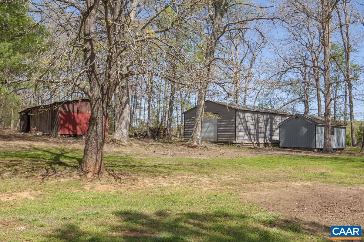 8882 James River Road Shipman, VA 22971 - Photo 37 of 50 a view of a house with backyard and trees
