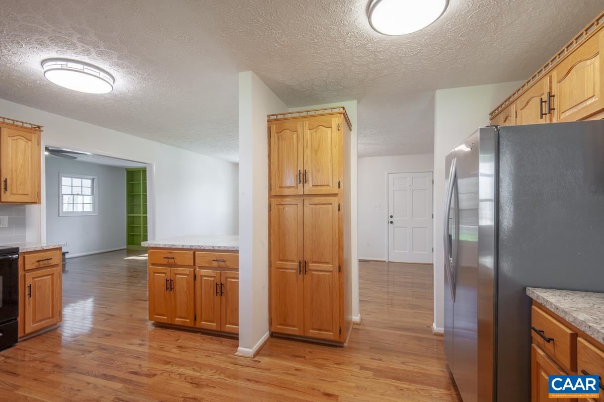 8882 James River Road Shipman, VA 22971 - Photo 5 of 50 a view of a livingroom with wooden floor and closet