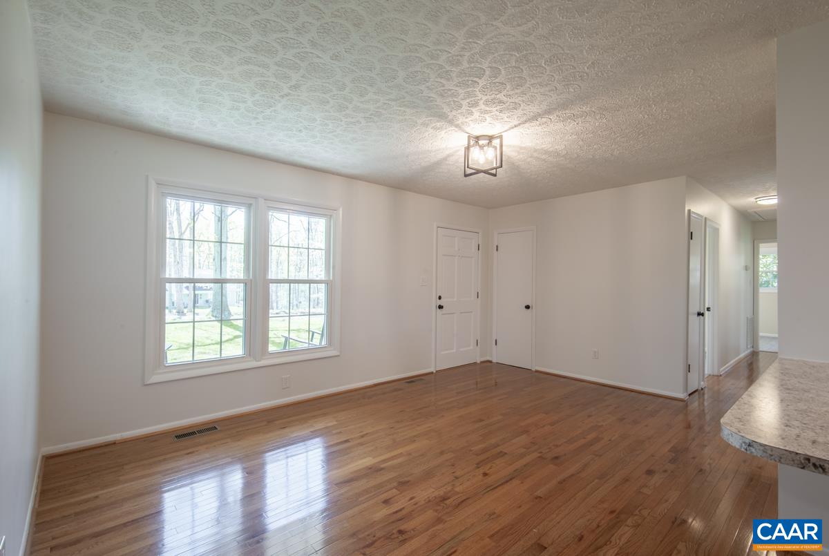 8882 James River Road Shipman, VA 22971 - Photo 8 of 50 wooden floor in an empty room with a window