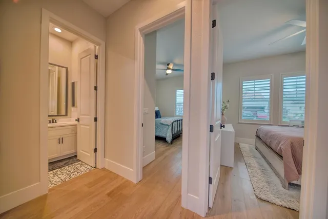 a view of a bathroom with tub and shower