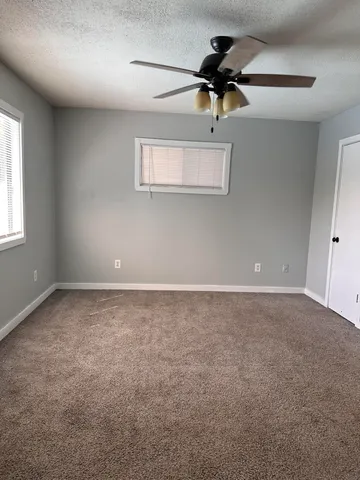 a view of a window in an empty room