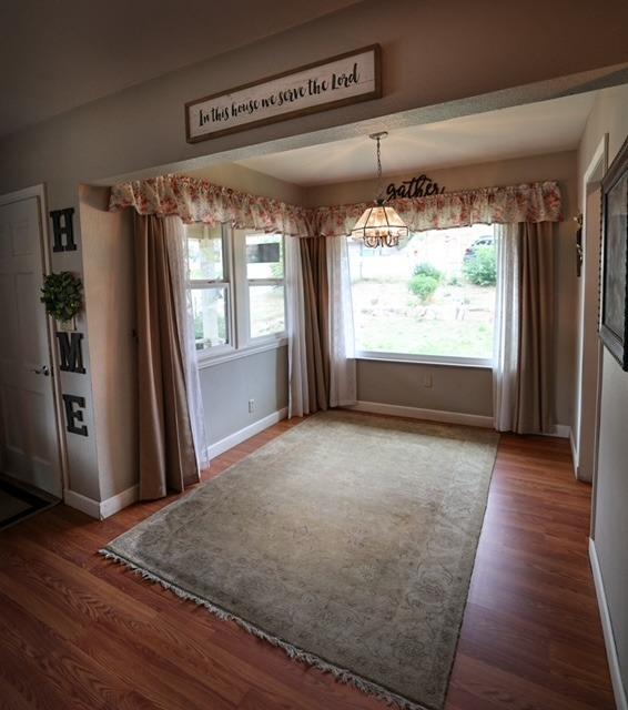 57064 Road 225 North Fork, CA 93643 - Photo 3 of 9 a view of a room with wooden floor and a window