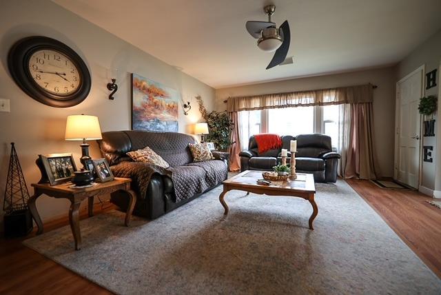 57064 Road 225 North Fork, CA 93643 - Photo 5 of 9 a living room with furniture a rug a lamp and a large window