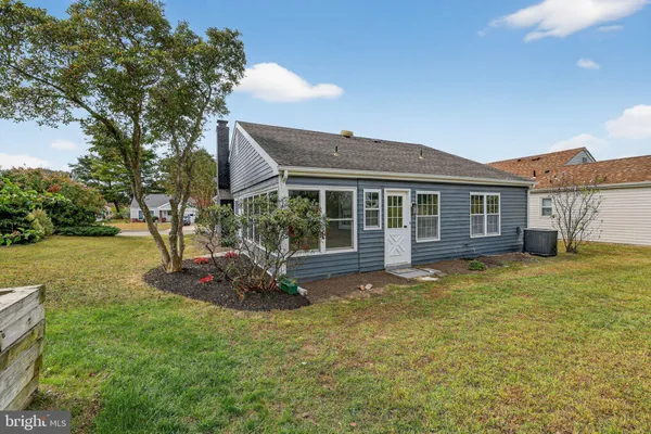 a house view with a garden space