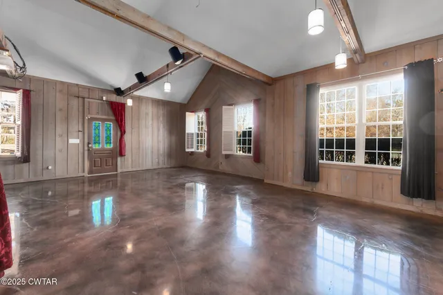 a view of kitchen with wooden floor