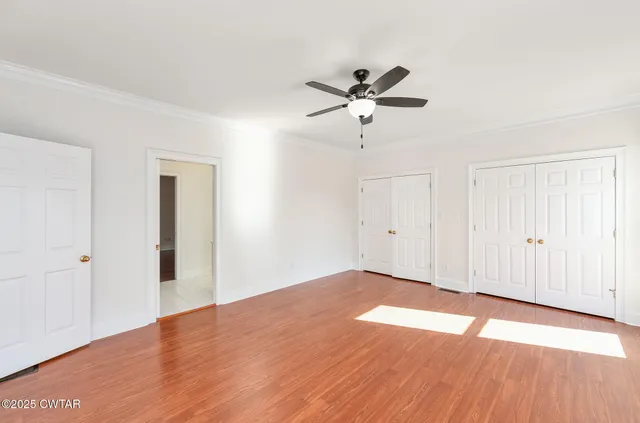 a house with trees in front of it