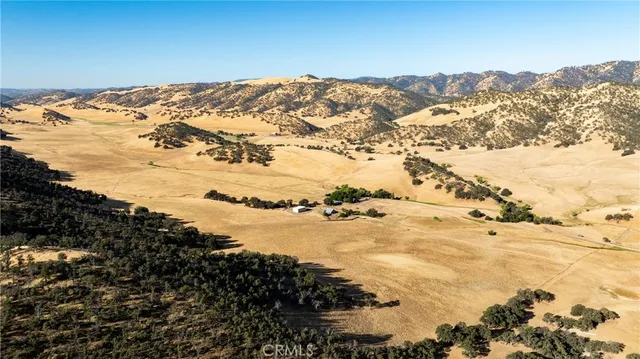 a view of mountain view with mountains in the background