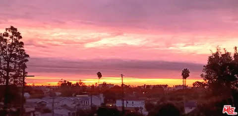 a view of a city with sunset view