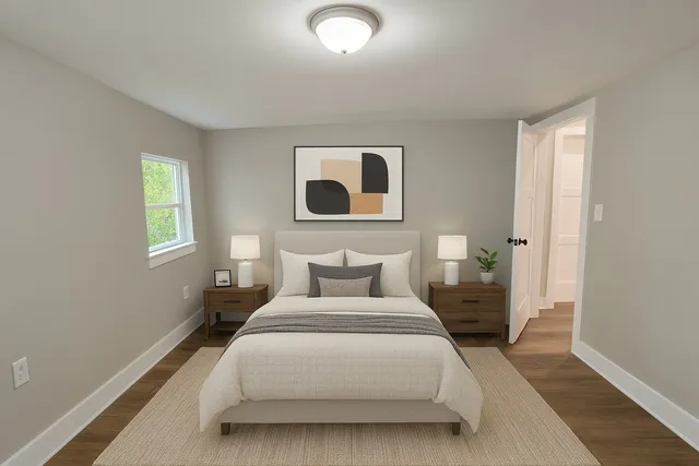 a kitchen with stainless steel appliances granite countertop a sink a window and wooden floor