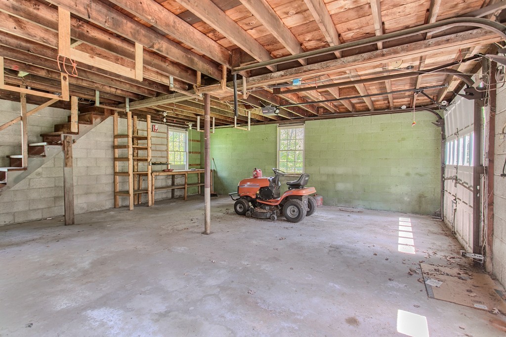 335 Ayer Road Harvard, MA 01451 - Photo 22 of 22 a view of a garage with parked cars