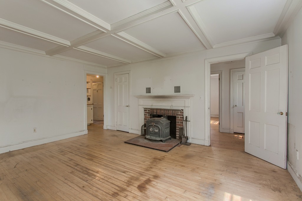 335 Ayer Road Harvard, MA 01451 - Photo 10 of 22 a view of an empty room with fire place