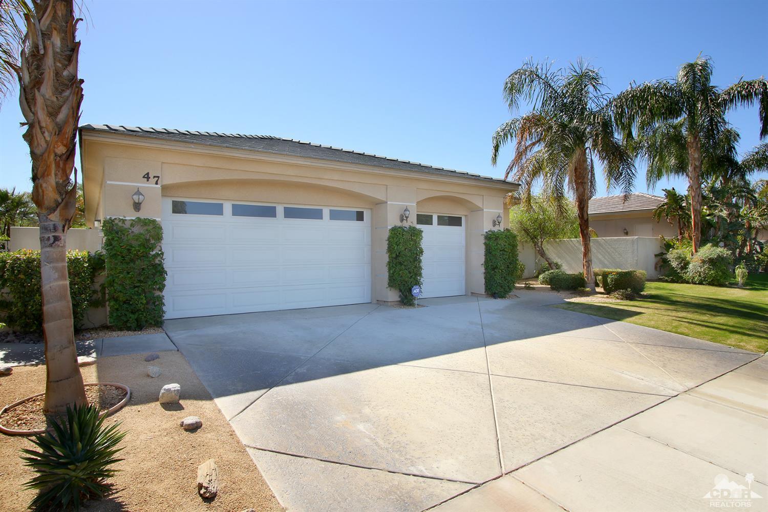 47 Provence Way Rancho Mirage, CA 92270 - Photo 29 of 30 a view of a white house with a yard