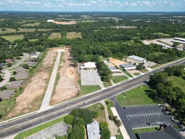 an aerial view of a house with a garden