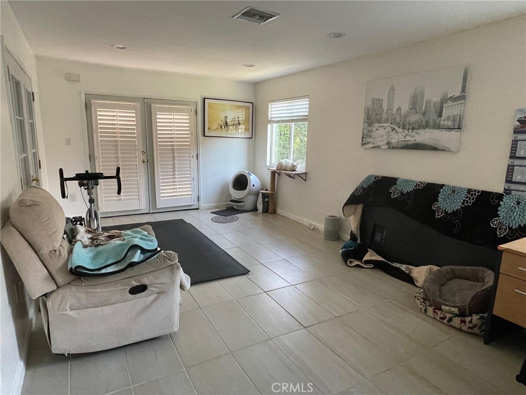840 East Meadbrook Street Carson, CA 90746 - Photo 11 of 32 a living room with furniture and a window