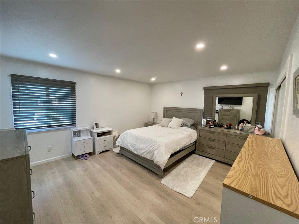 840 East Meadbrook Street Carson, CA 90746 - Photo 22 of 32 a bed room with a bed and a large window