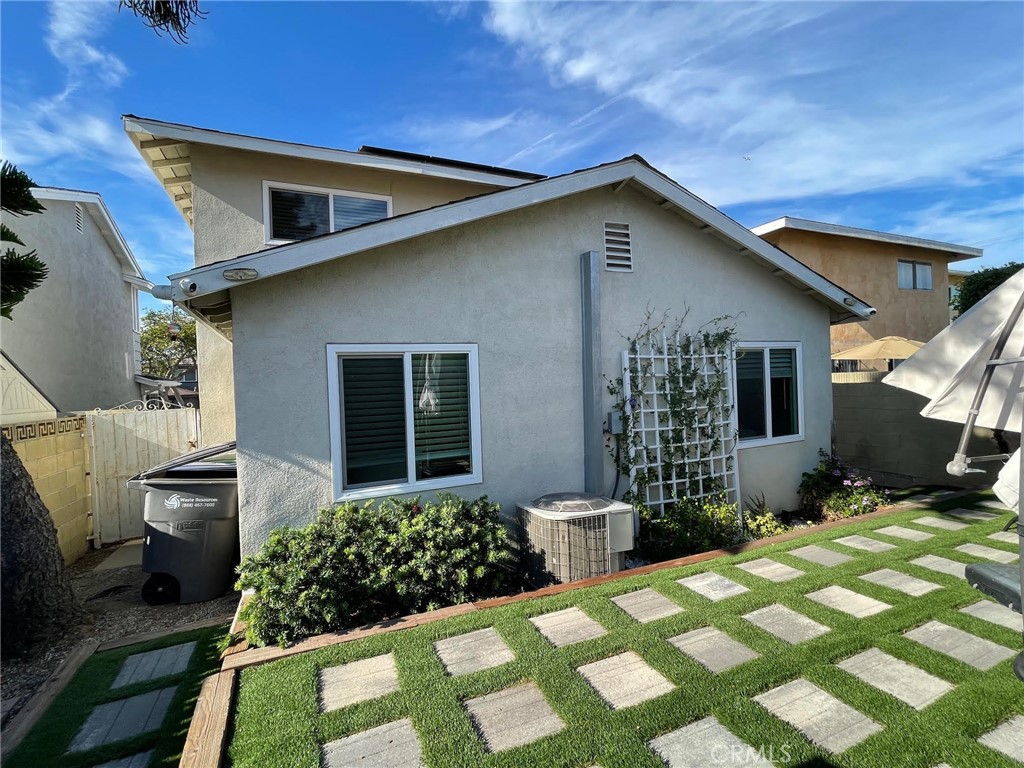 840 East Meadbrook Street Carson, CA 90746 - Photo 29 of 32 a front view of a house with a yard
