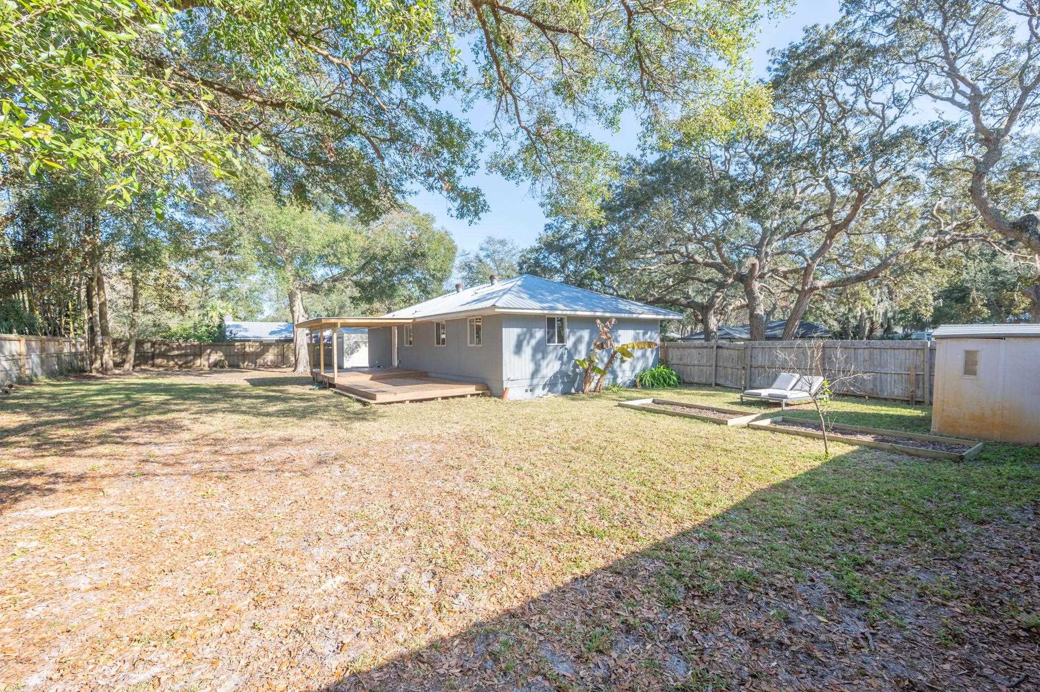 414 Jasmine Road St. Augustine, FL 32086 - Photo 20 of 30 a view of a house with swimming pool