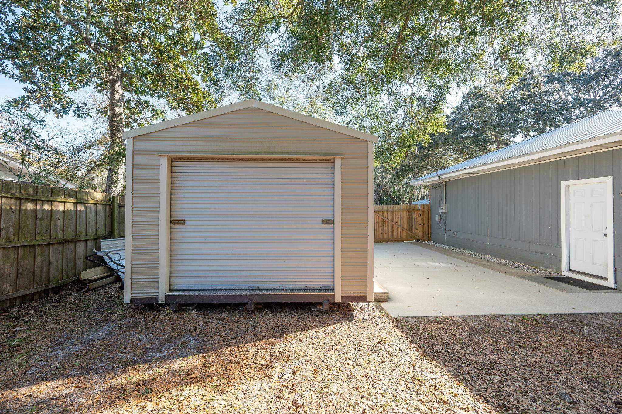 414 Jasmine Road St. Augustine, FL 32086 - Photo 23 of 30 a front view of a house with a garage