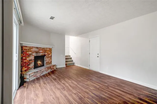 a white toilet sitting next to a bath tub