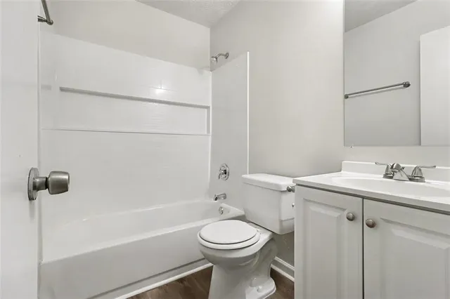 a house with a tree in front of it