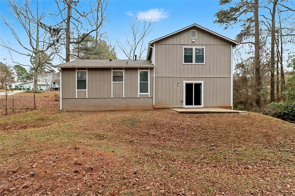 3723 Chimney Ridge Court Ellenwood, GA 30294 - Photo 32 of 33 a front view of a house with a yard
