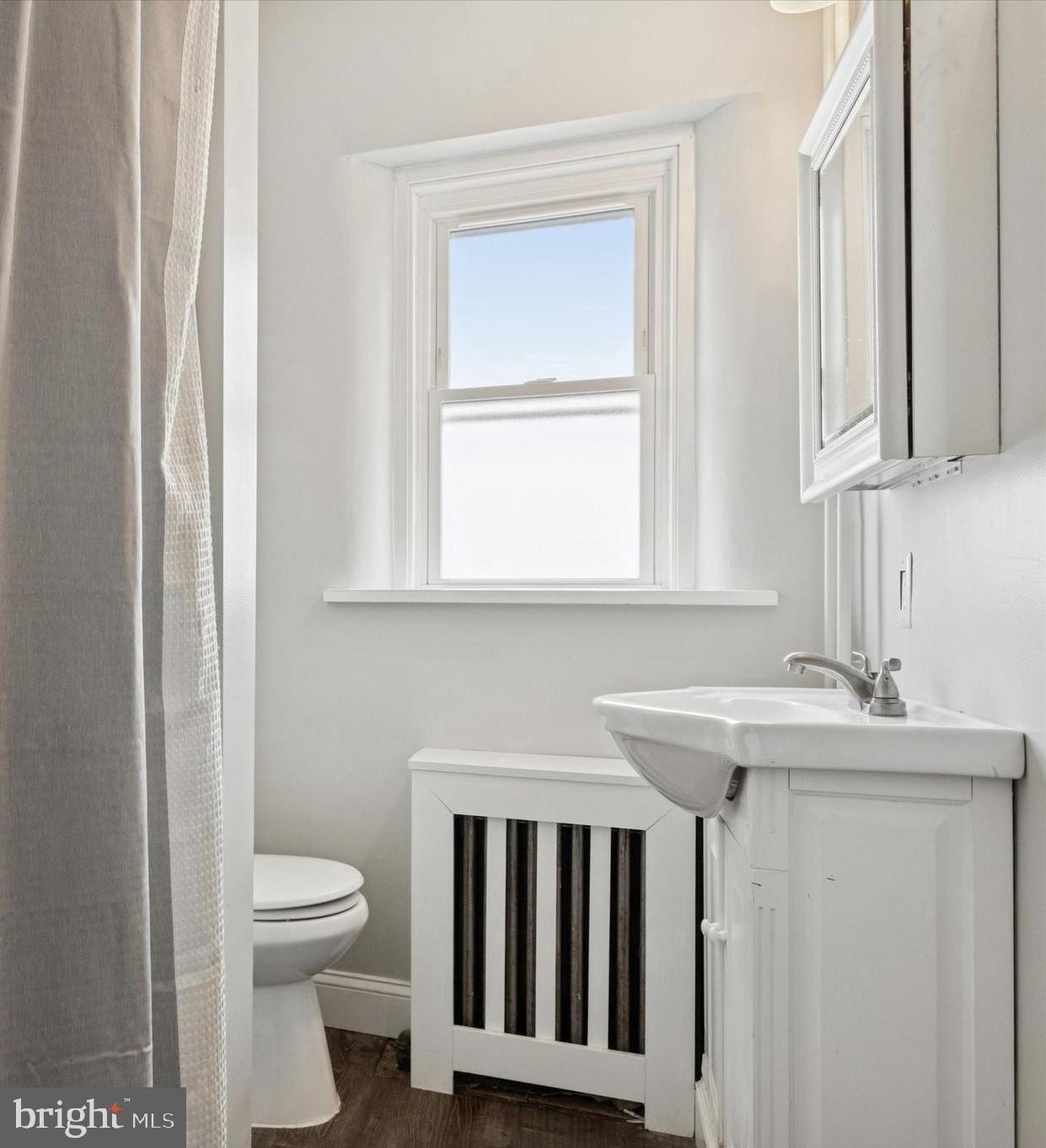 1185 Kepler Road Pottstown, PA 19464 - Photo 8 of 21 a bathroom with a sink a toilet and a window